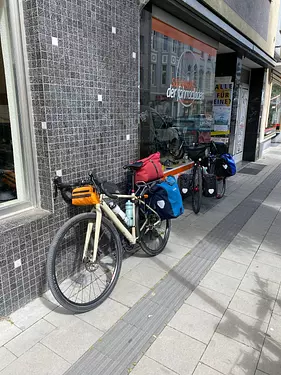 our bikes parked on the sidewalk