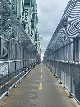 a bridge with many metal rails