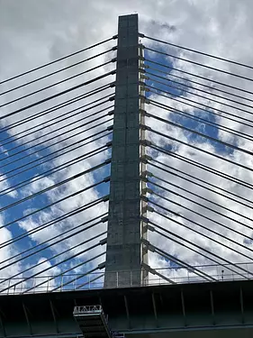 a tall building with many wires