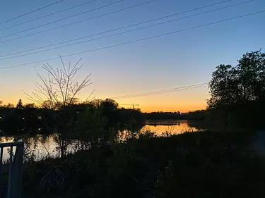 a sunset over the Rideau river