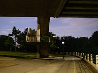 a road with a bridge over it