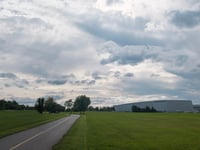 a road next to a field