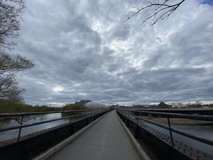 a bridge with a road and trees