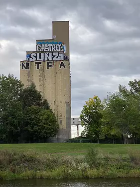 a large tower with graffiti on it