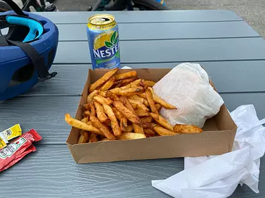 essential food: a basket of french fries and a can of soda