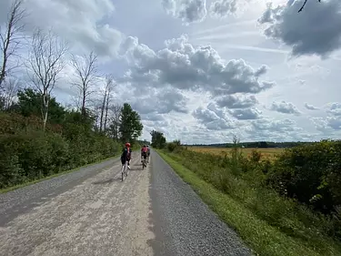 friends riding bicycles on a road