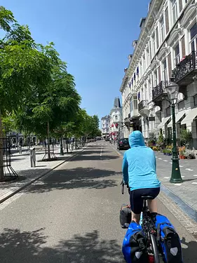 Felix riding a bicycle on a street