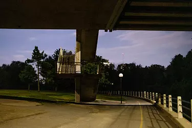 a road with a bridge over it