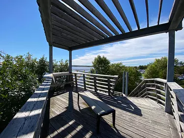 a wood deck with benches