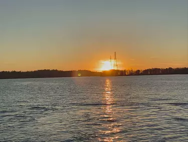 sunset by the water