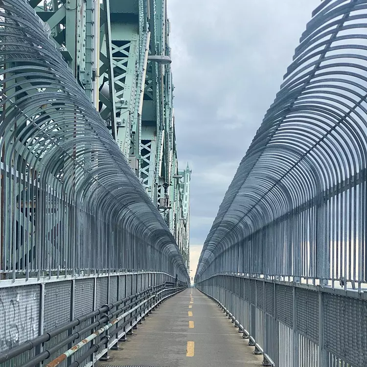 a bridge with many metal rails