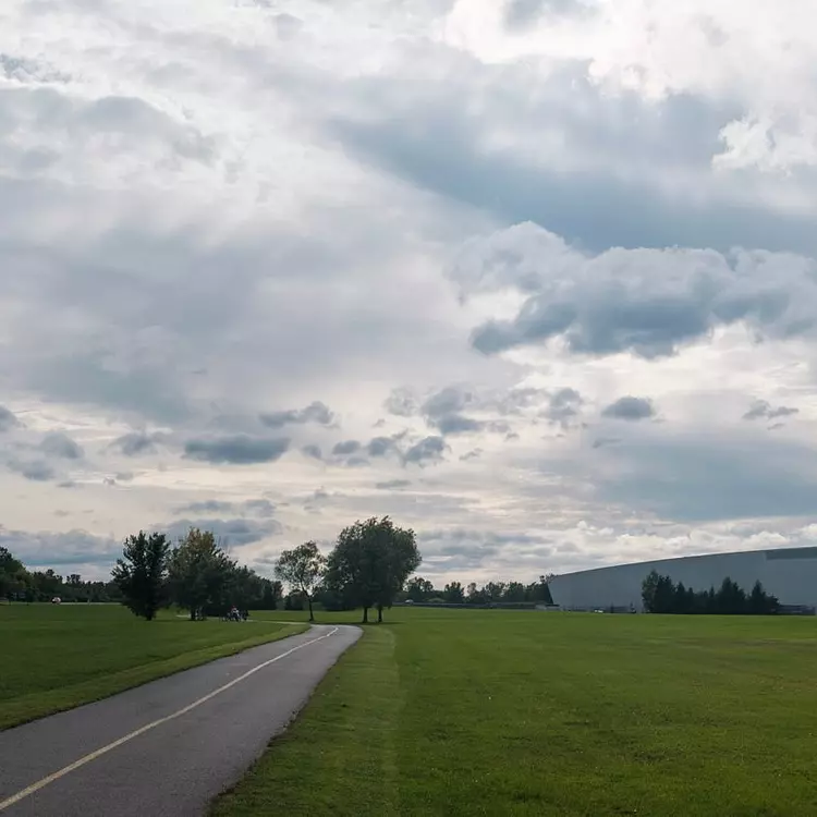 a road next to a field