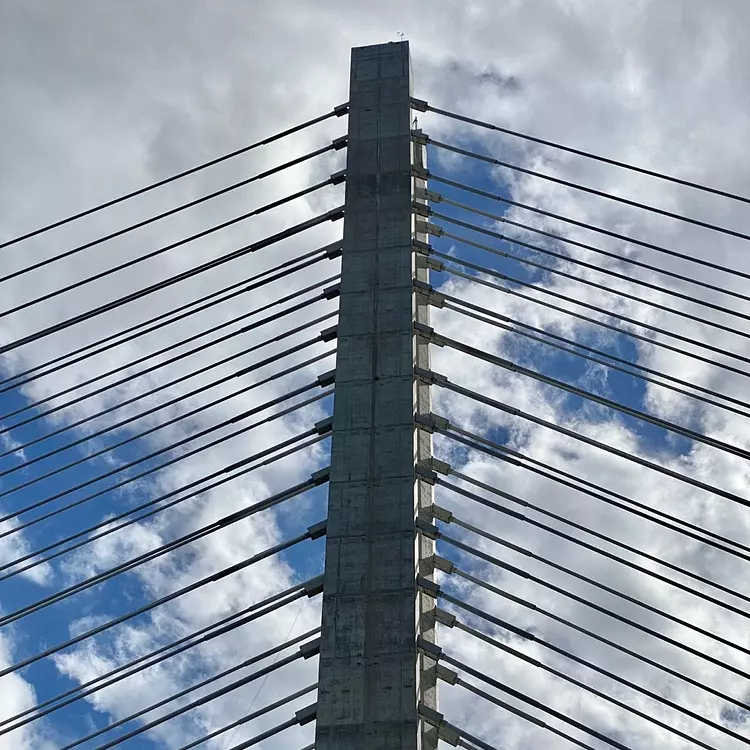 a tall building with many wires