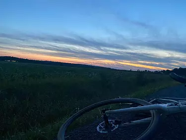 a bike parked in a field